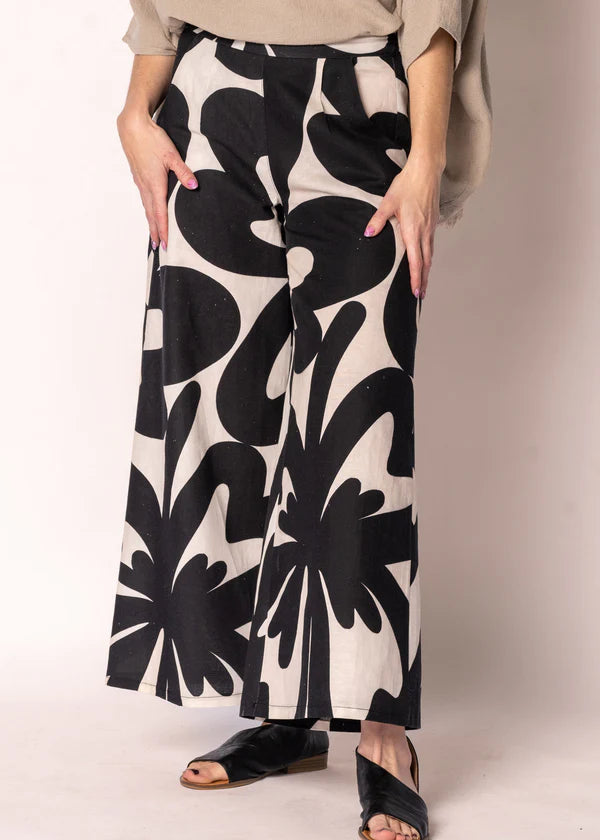 Cream linen-cotton straight-leg pants with black print, elasticated back waistband, flat front and side pockets