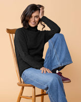 Ribbed turtle neck sweater in soft possum merino blend with fitted silhouette
