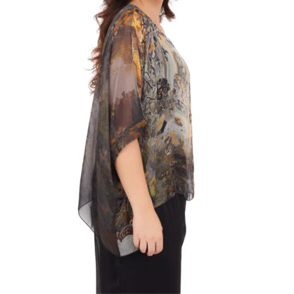 Nero Italian silk top with a relaxed silhouette, soft flowing fabric, and elegant drape in a natural earthy tone.
