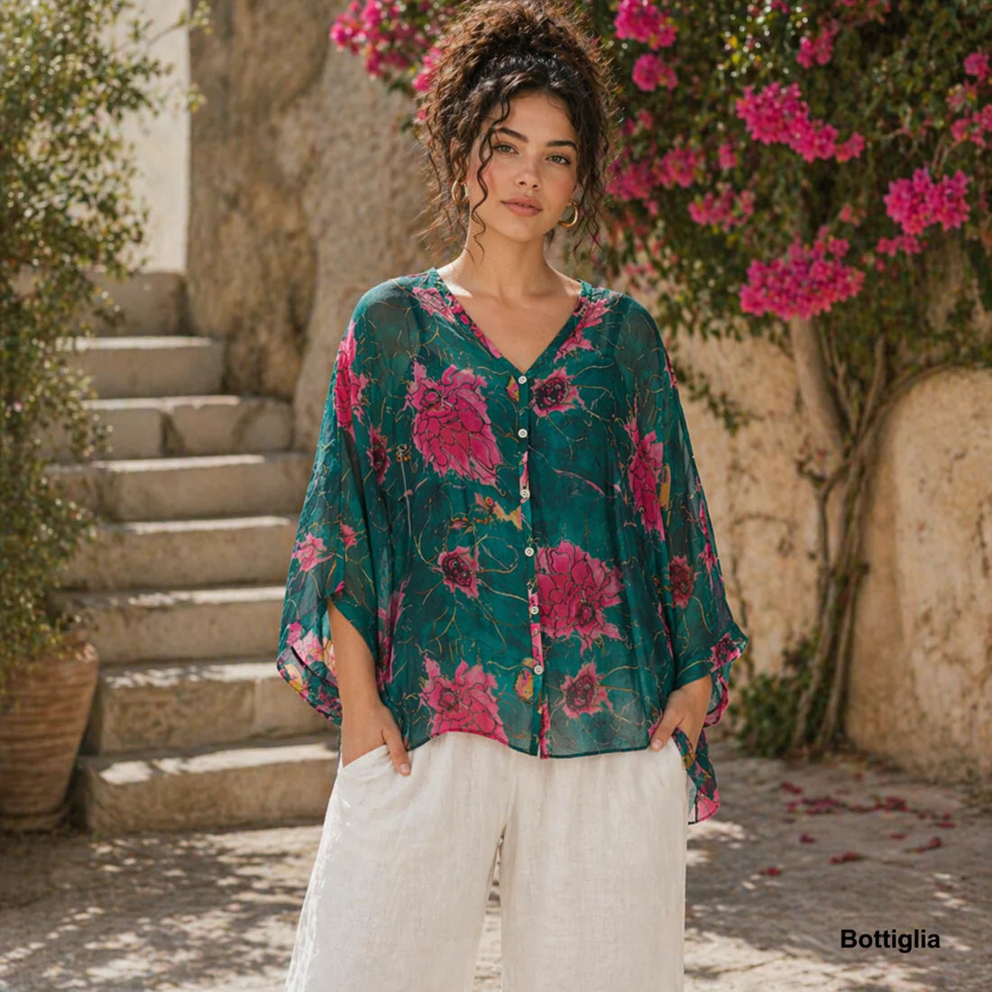 Bottiglia green Italian silk button-up top with a V-neckline, relaxed fit, and soft flowing overlay in a deep green tone.