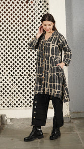 Black linen-cotton jacket with tortoise-look print, collarless neckline, wood-look buttons and drawstring pockets