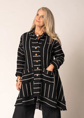 Black linen-cotton jacket with subtle stripe, button front, fringed hem and cuffs, and relaxed tailored fit