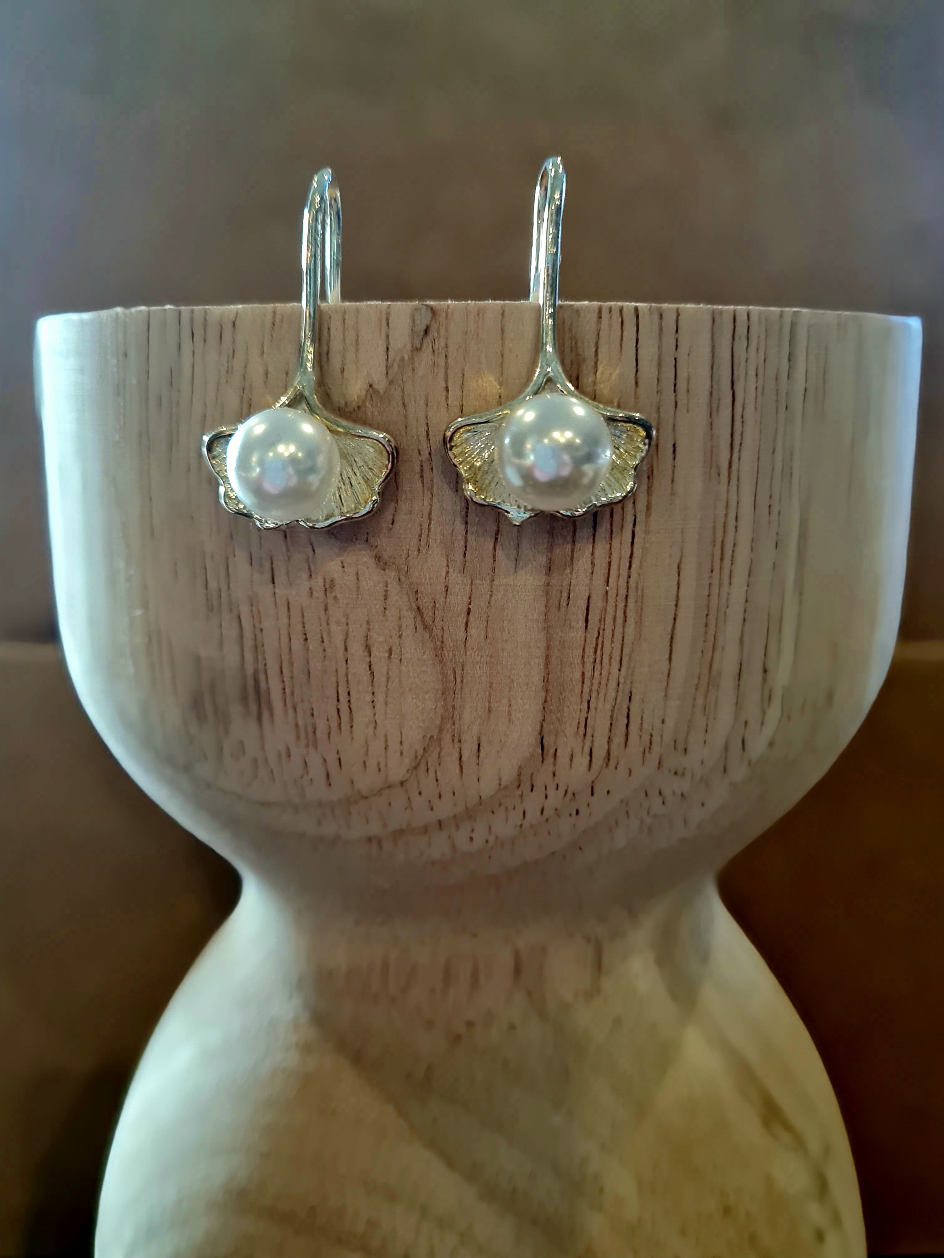 Sterling silver fan-shaped drop earrings with hook fastening, featuring a pearl set in the center of each fan. Check them out at Linens & Treasures Rolleston