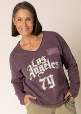 Lilia Cotton Sweat Top in rich Mulberry, a comfortable and stylish layering piece from Linens & Treasures, perfect for cooler summer evenings or relaxed travel days.