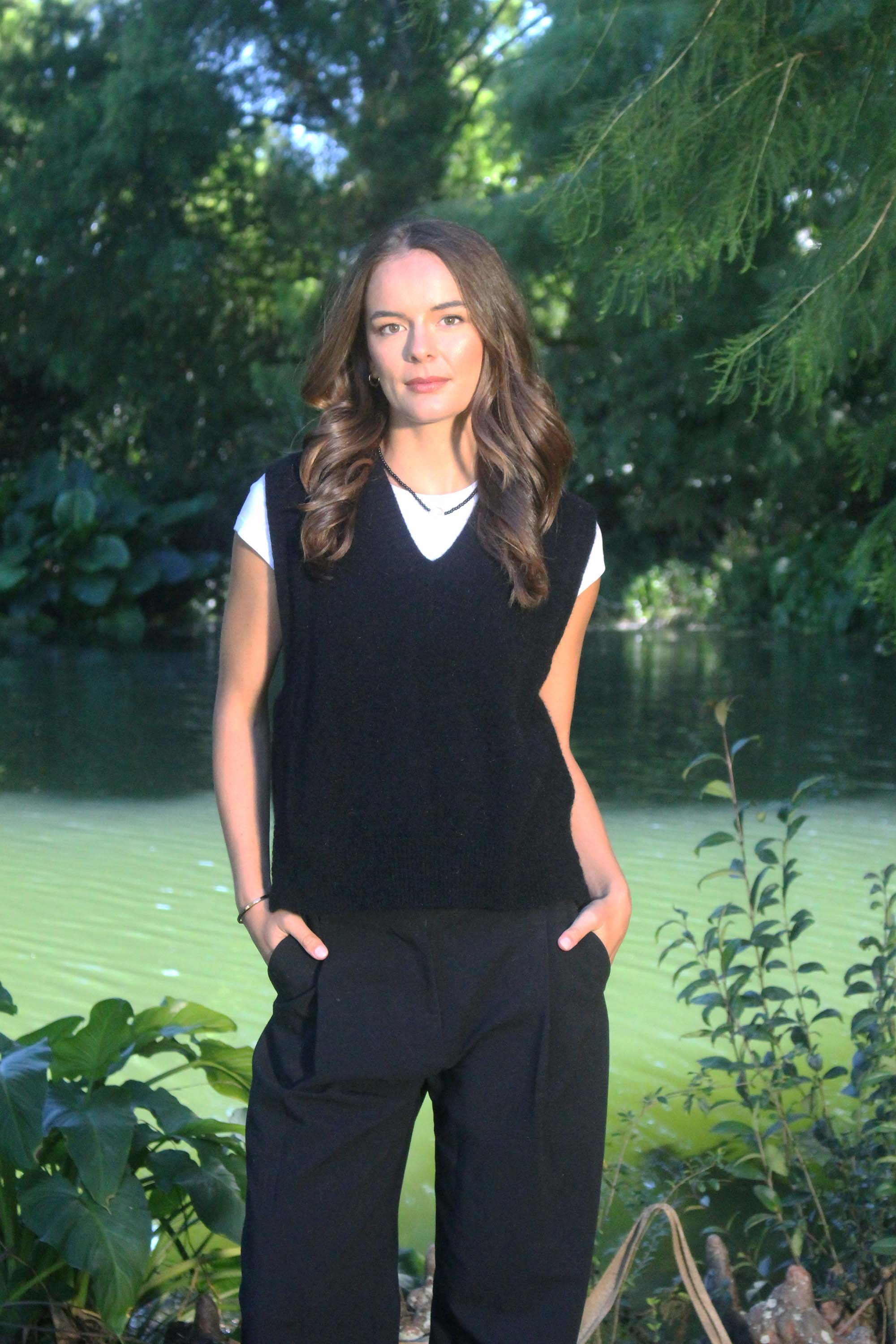 Lothlorian Ride Vest in Black, crafted from premium Possum Merino knit with a V-neckline, ribbed drop hem, overlapping side vents and a relaxed layering silhouette.