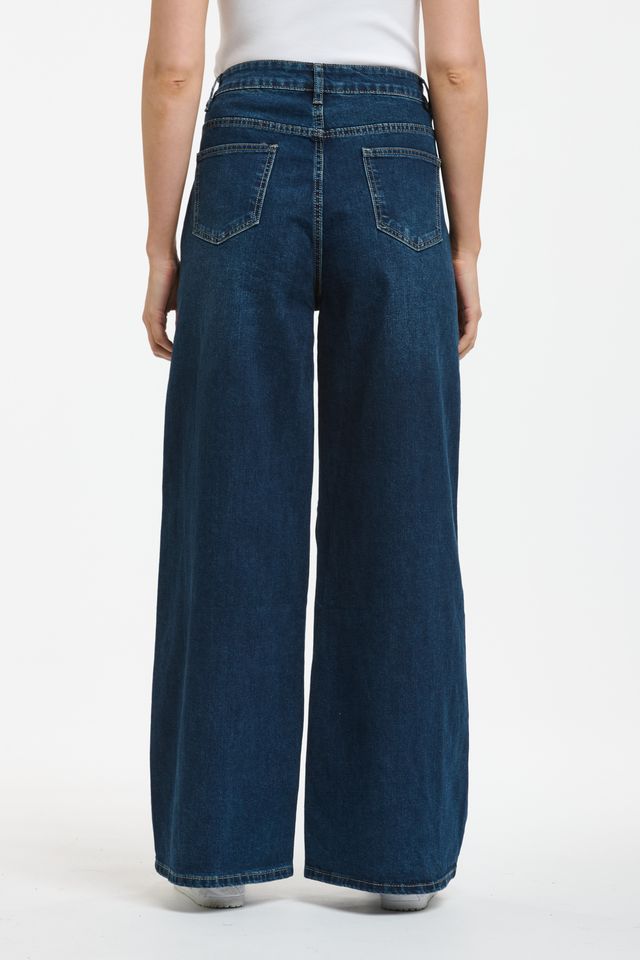 Mid-blue denim jeans with relaxed fit and tapered leg, featuring classic five-pocket styling