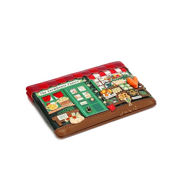 Vendula London The Farmhouse Pantry Zipper Coin Purse in printed and embossed vegan leather, featuring colourful farm-shop-inspired artwork with fresh countryside details. Designed with hand-stitched accents, a secure zip closure, three card slots, an attached keychain and iconic Vendula London patterned lining.
