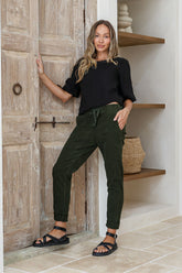 Juniper green cotton pants with cuffed legs and adjustable tie waist