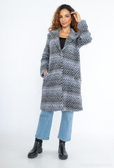 Vibrant thick warm below the knee winter coat with pockets in grey black & white and jeans by Ornello Paris Mademoiselle Manteaux fashion label displayed in-store at 18 Riverstone Drive Rolleston Selwyn NZ