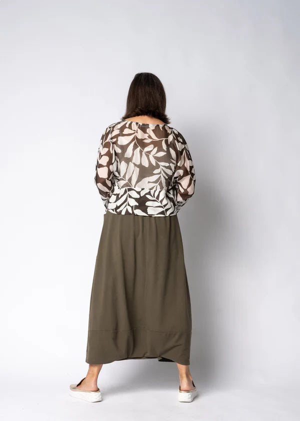 Moss green skirt with relaxed flowing silhouette, soft drape and comfortable everyday fit