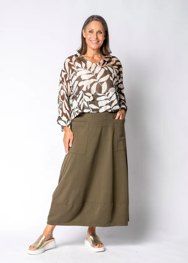 Moss green skirt with relaxed flowing silhouette, soft drape and comfortable everyday fit