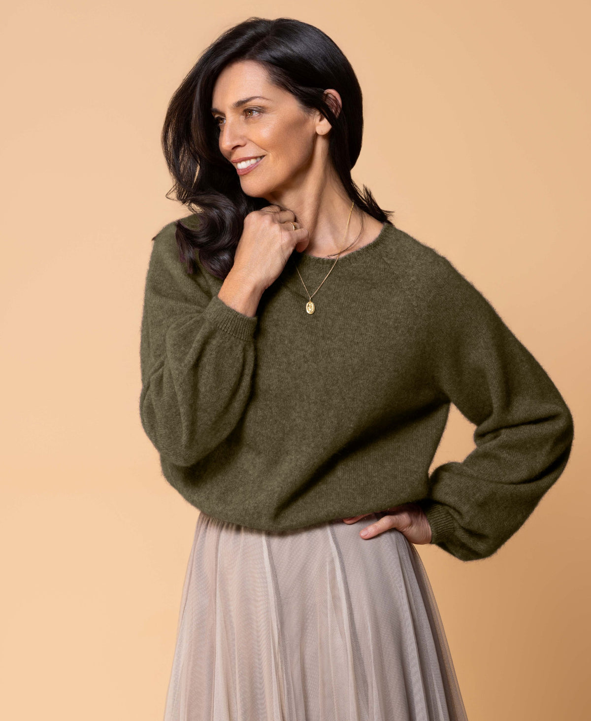 Classic button cardigan in soft possum merino blend with clean neckline and fitted shape