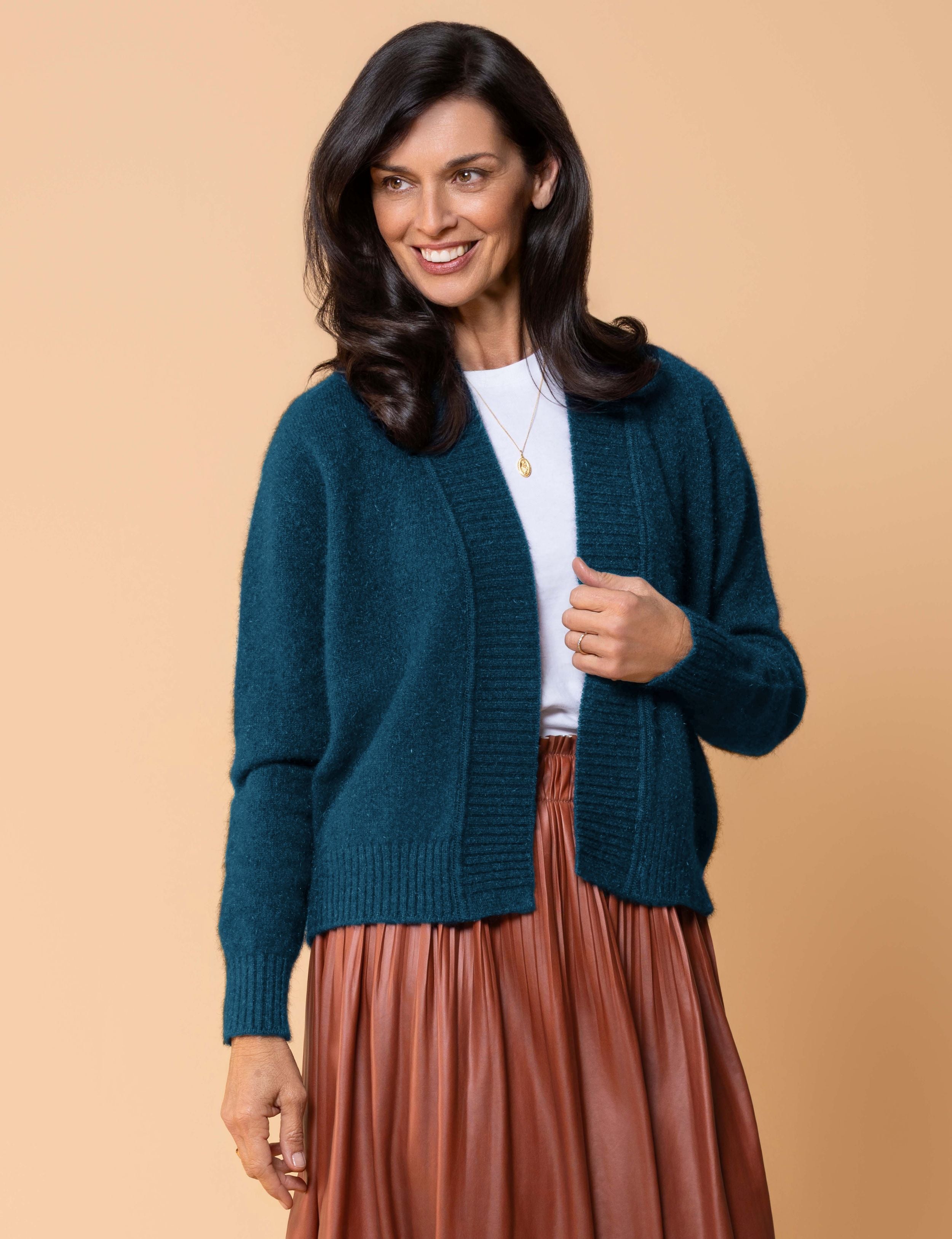 Classic button cardigan in soft possum merino blend with clean neckline and fitted shape