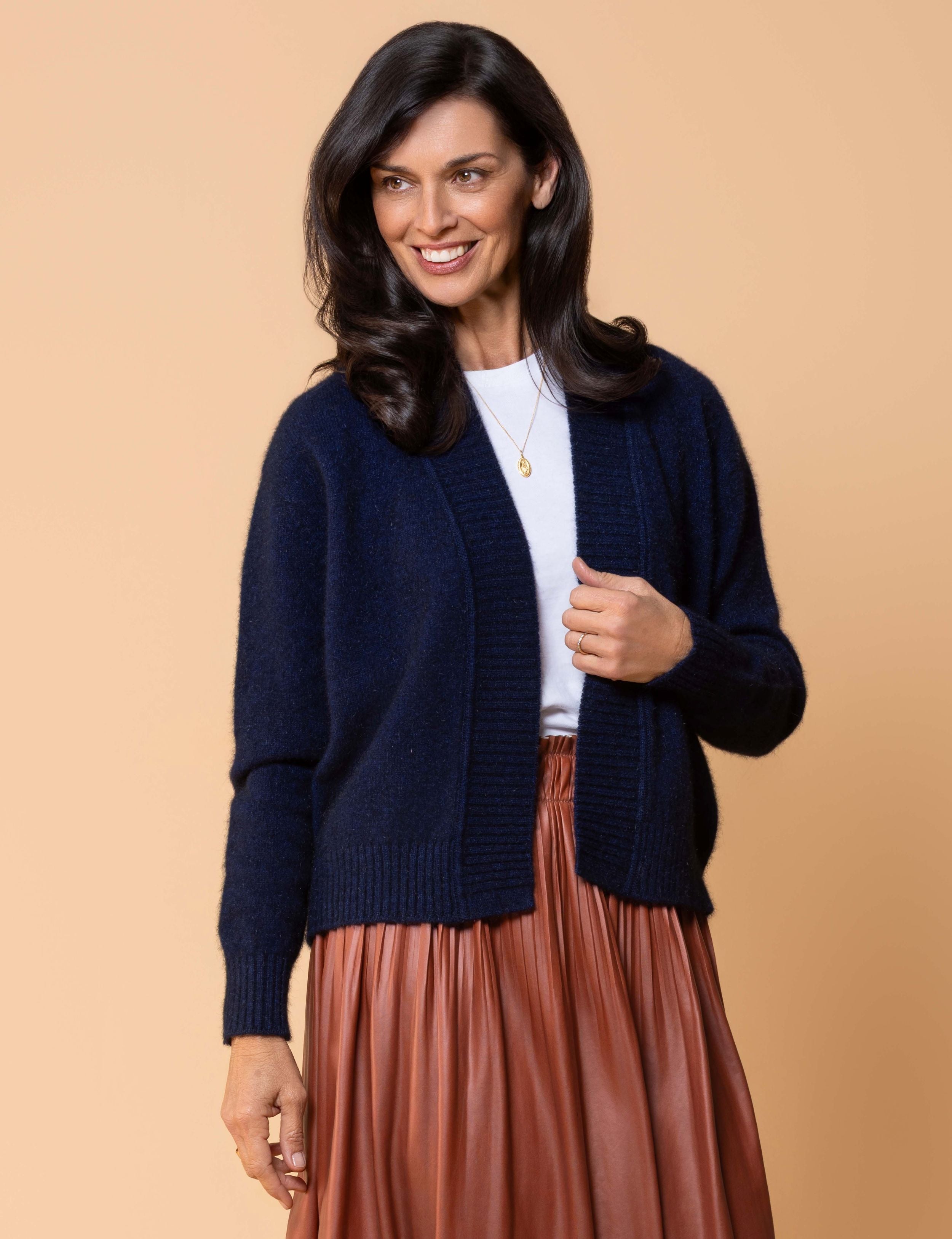 Classic button cardigan in soft possum merino blend with clean neckline and fitted shape