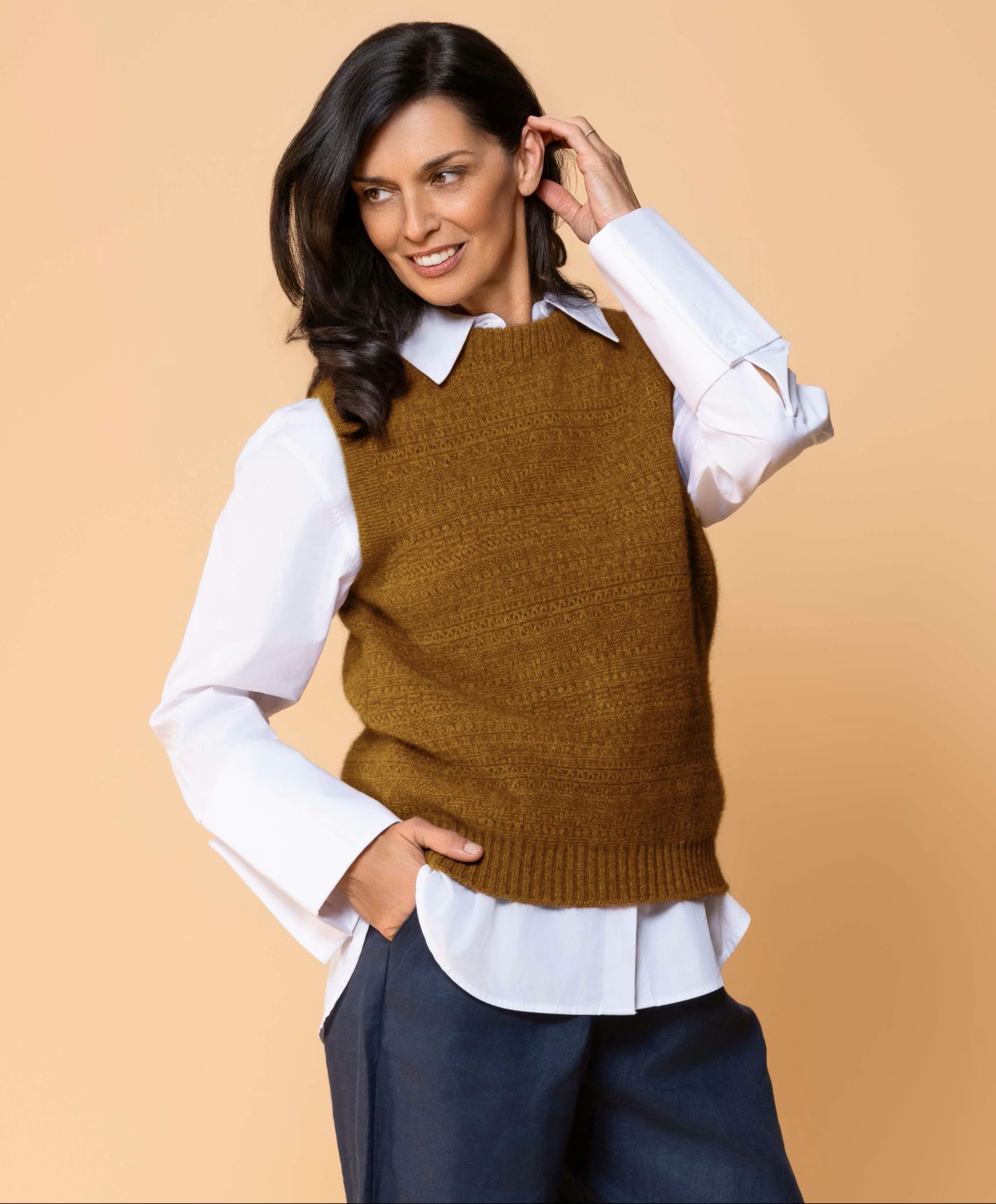 Lightweight sleeveless vest in possum merino blend for layering