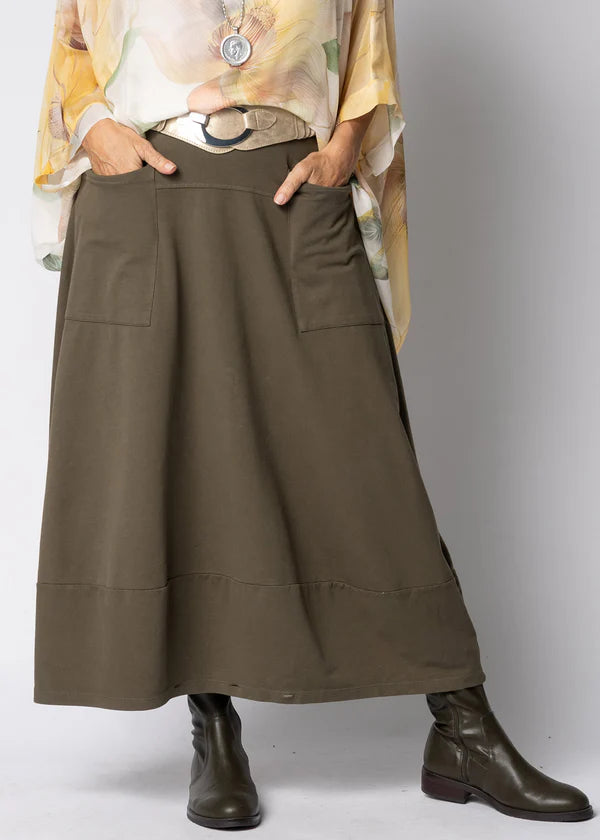 Moss green skirt with relaxed flowing silhouette, soft drape and comfortable everyday fit