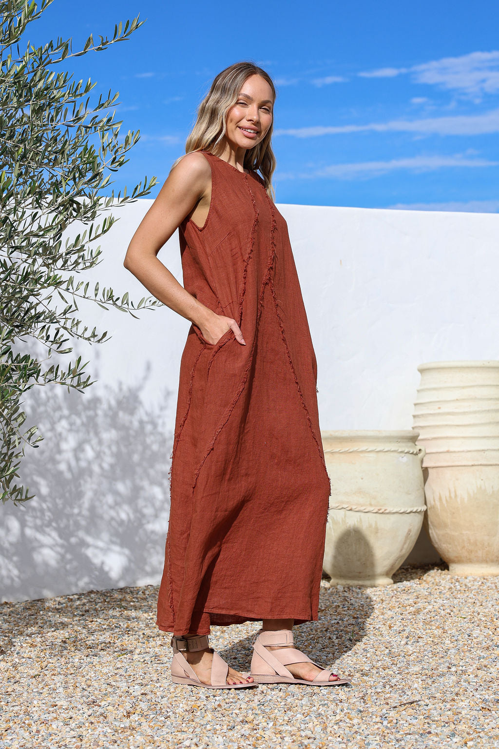 Coco linen full-length dress with cut-off sleeves, hidden side pockets and geometric texture
