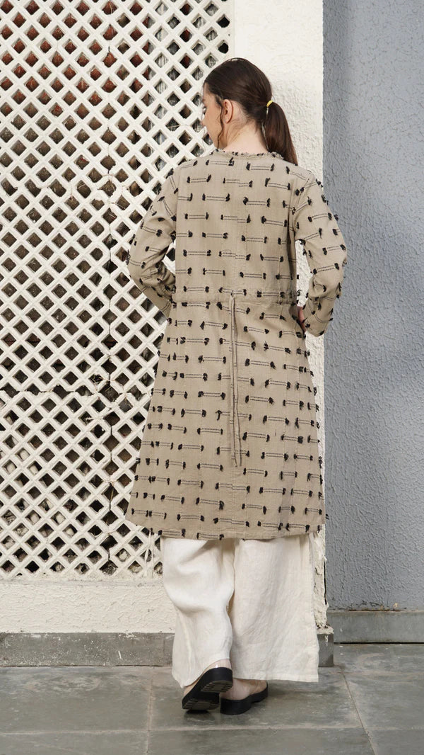 Cotton jacket with band collar, faux-wood buttons, fringe detailing and adjustable drawstring back