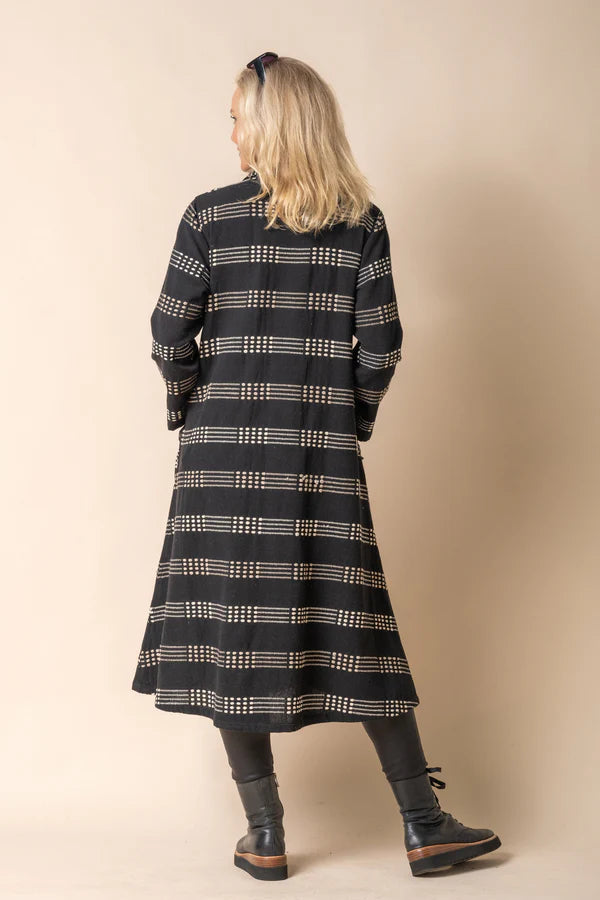 Black cotton longline jacket with collared neckline, button front, stitched detailing and relaxed fit