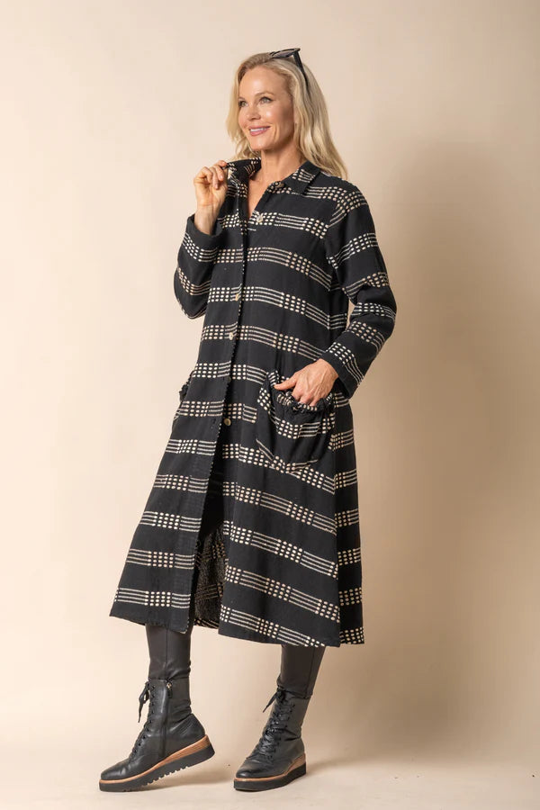 Black cotton longline jacket with collared neckline, button front, stitched detailing and relaxed fit