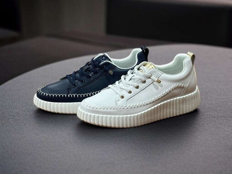 Bragi Aria leather platform sneaker available in navy and white, featuring a modern silhouette, fixed lace detail, subtle metallic accents, contrast stitching, lightweight platform sole and premium leather construction.