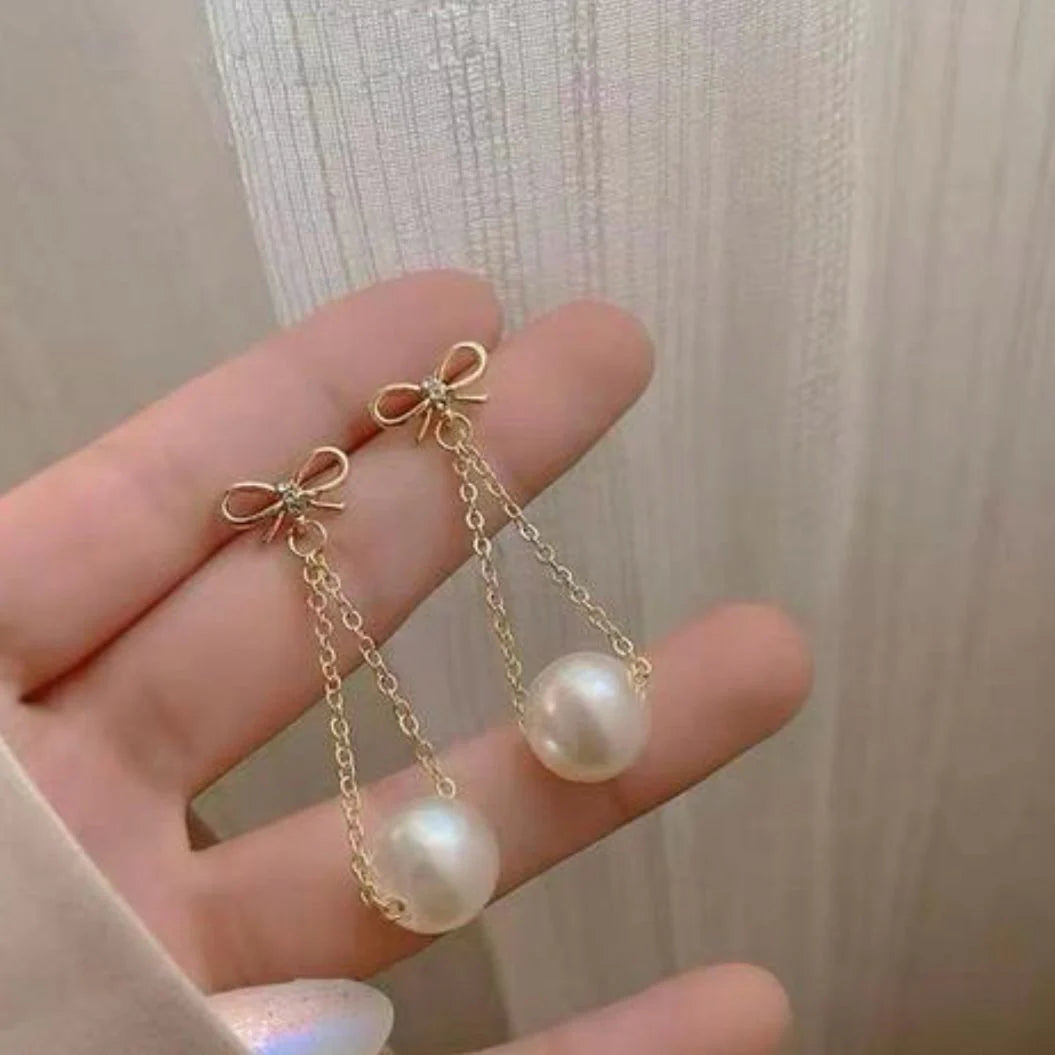 Bow with Hanging Pearl Gold Earrings