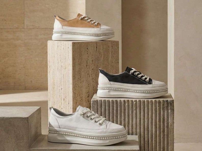 Bragi Florence leather platform sneaker available in beige, black and camel, featuring a lace-up design, contrast panel detailing, pearl-trimmed platform sole, premium leather upper and contemporary casual silhouette. Range now at Linens & Treasures