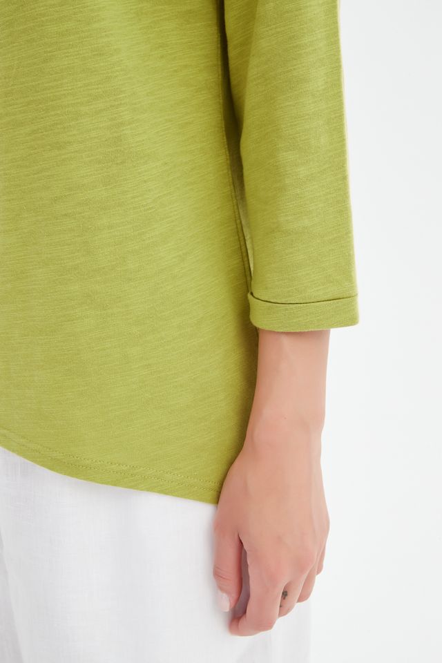 Chartreuse cotton slub tee featuring a round neckline with V-insert detail, 3/4 sleeves, relaxed fit, and curved hem.