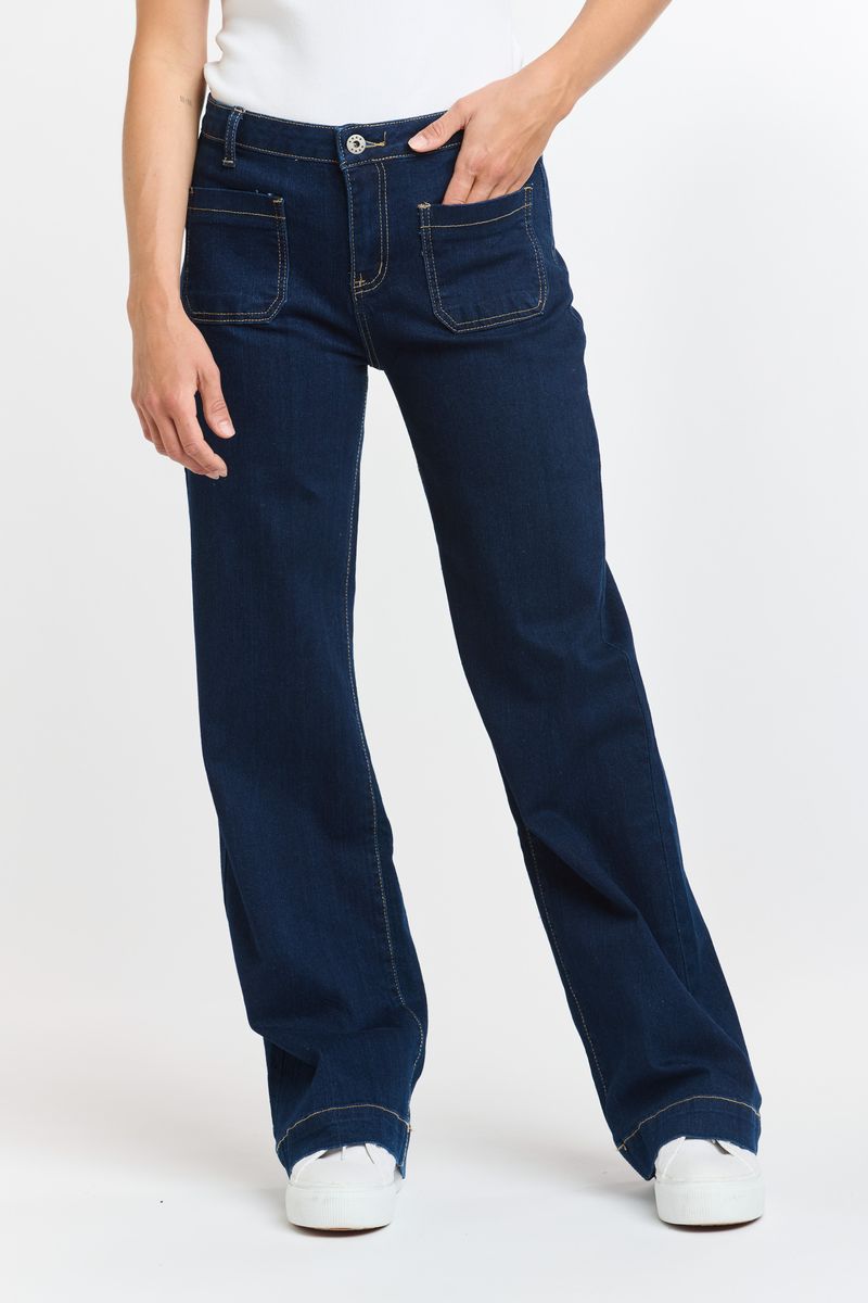 Blue denim barrel leg jeans with curved silhouette and tapered ankle