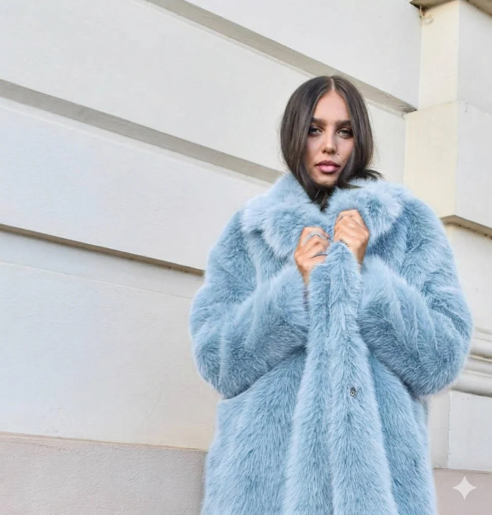 Light blue long faux fur coat with classic collar and two-button front closure in a soft, plush finish.