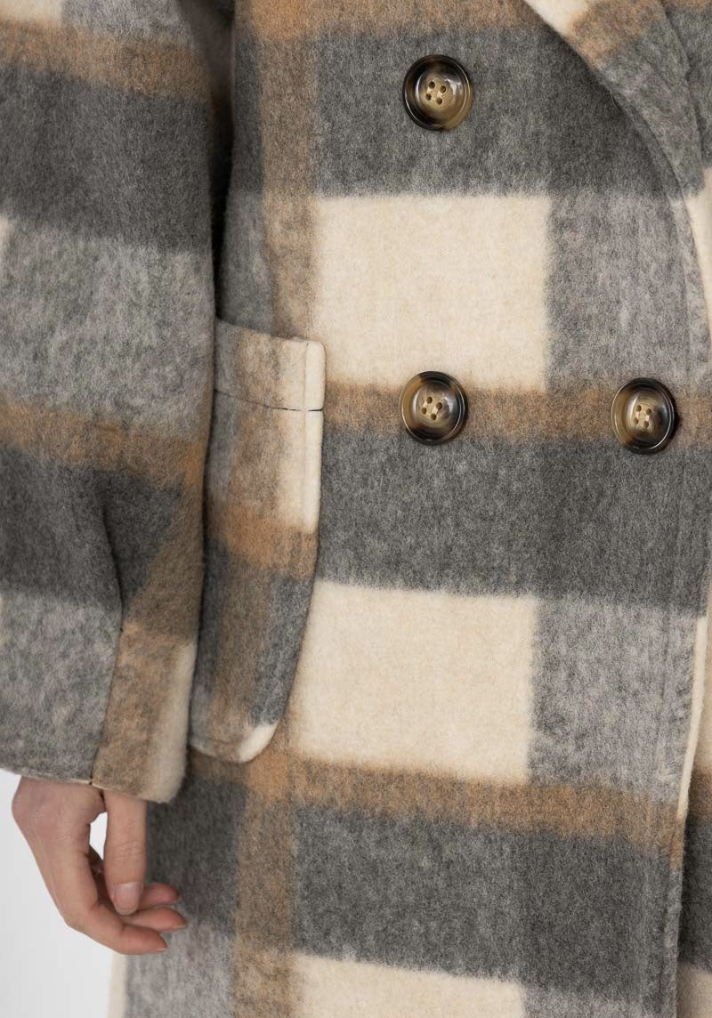Beautiful thick warm winter check coat in grey and beige by Ornello Paris fashion label displayed in-store at 18 Riverstone Drive Rolleston Selwyn NZ