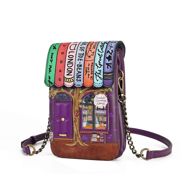 Vendula London The Travelling Library Bookshop Phone Pouch in printed and embossed vegan leather, featuring charming bookshop artwork with colourful book spines, deep purple tones and reading-inspired details. Designed with hand-stitched accents, magnetic flap fastening, secure zip closure, front slip pocket, two internal compartments, back zipped pocket and detachable flat shoulder strap.