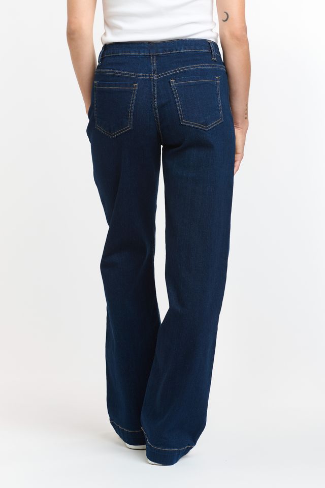 Blue denim barrel leg jeans with curved silhouette and tapered ankle