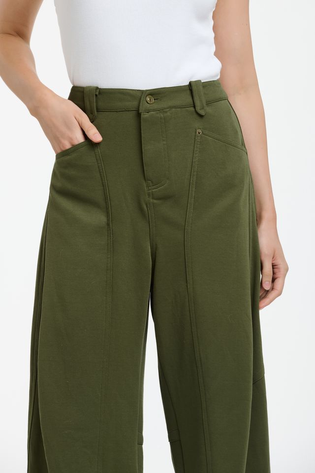 Italian Star PIMMS Pant in Khaki featuring a relaxed high-rise fit with a modern wide-leg barrel silhouette. Crafted in a stretch cotton blend, these slouchy pants feature a unique front pocket panel detail, belt loops, zip fly, and cargo-style patch pockets on the back for an effortless contemporary look.