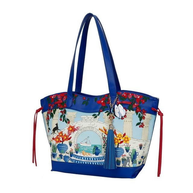 Vendula London Gardens of the World Greece Stella Tote in blue vegan leather, featuring printed and embossed floral, cat and seaside artwork on one side and blue butterfly artwork on the reverse, with two carry handles and zip closure.